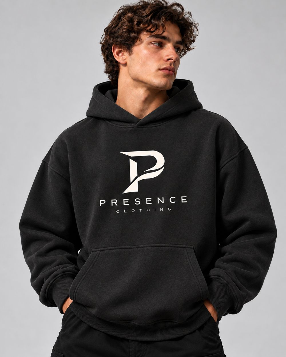 Man in the black Presence Hoodie